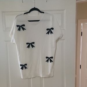 White Short-Sleeve Crewneck Sweater with Black Bow Accents
